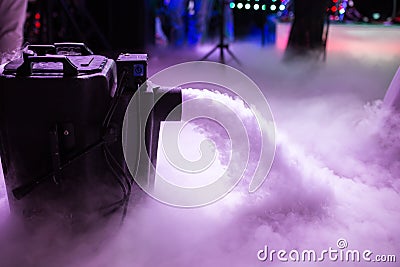 Dry ice low fog machine with hands on for wedding first dance in restaurants Stock Photo