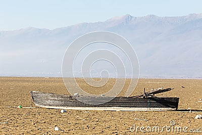 Dry lake bed with natural texture of cracked clay in perspective Stock Photo