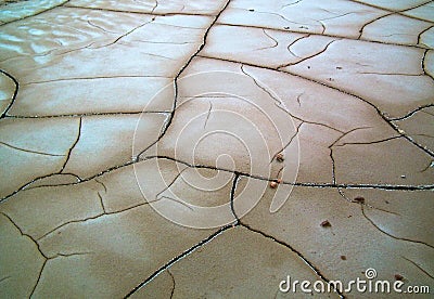 Dry mud cracked pattern on desert ground , natural texture of Earth Stock Photo