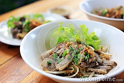 Dry noodle with boiled beef and fresh vegetables Stock Photo
