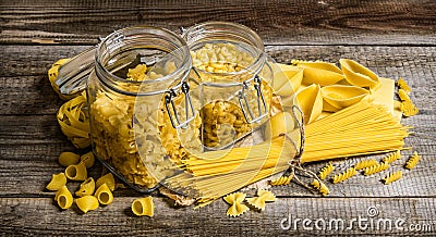 Dry pasta in cans and mixed the pasta with spaghetti. Stock Photo