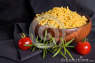 Dry pasta closeup uncooked on background Stock Photo