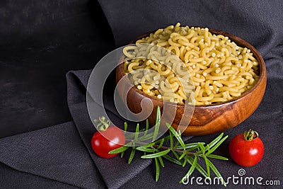 Dry pasta closeup uncooked on background Stock Photo