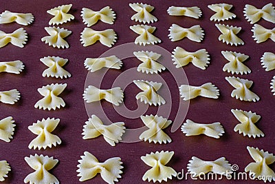 Dry pasta yellow on a dark background. Italian food Stock Photo