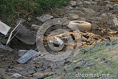 Dry river water pollution dumping of garbage and waste Stock Photo