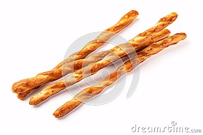 A dry, salty, crispy Grissini pretzel atop a white surface viewed from Stock Photo