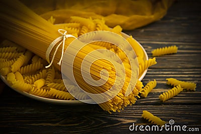 Dry spaghetti cuisine gourme bunch group delicious collection t on wooden background nutrition uncooked Stock Photo