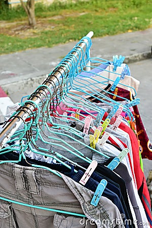 Drying cloth and hanger on cloth line Stock Photo