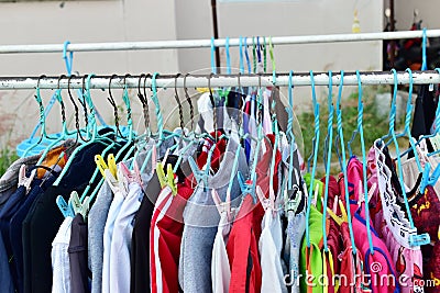 Drying cloth and hanger on cloth line Stock Photo