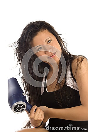 Drying hair blow dry Stock Photo