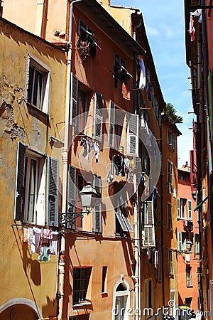 Drying laundry in narrow streets, Nice, France Stock Photo