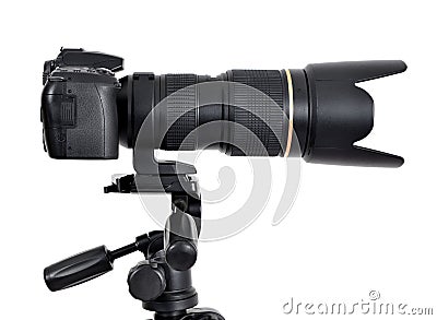 DSLR camera with zoom lense on a tripod Stock Photo