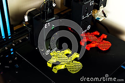 Dual extruder 3d printer which is printing two bicolor model, idex technology Stock Photo
