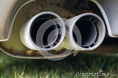 Dual Tailpipes on a Car Muffler Stock Photo
