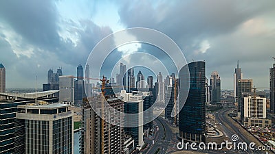 Dubai business bay towers early morning aerial timelapse. Stock Photo