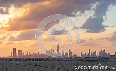 Dubai Downtown skyline with desert sand, United Arab Emirates or UAE. Financial district and business area in smart urban city. Editorial Stock Photo