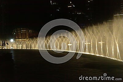 The Dubai Fountain with evening light show Editorial Stock Photo
