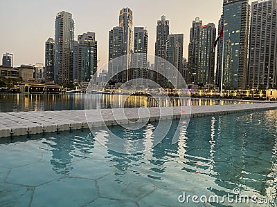 Dubai fountain with skyscrapers around Stock Photo