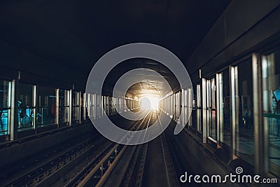 Dubai metro inside, subway station platform, view from train, corridor or tunnel view with perspective Stock Photo