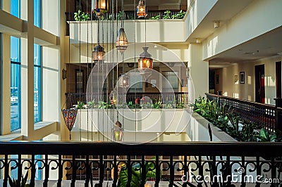 Dubai. In the summer of 2016. Modern and bright interior in the hotel Kempinski, Ajman. Designer chandelier in the lobby hotel. Editorial Stock Photo