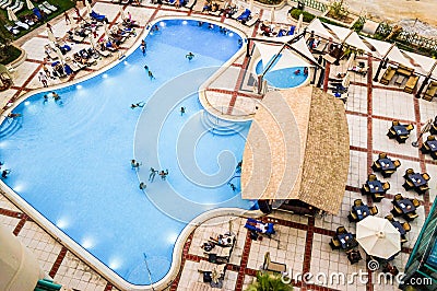 Dubai. Summer 2016. Pool people a view from the top of the hotel Hilton Dubai The Walk. Editorial Stock Photo