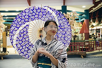 Portrait of an Japan girl to meet guests in the pavilion Japan o Editorial Stock Photo