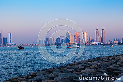 A view of Dubai seaside skyline at sunset. United Arab Emirates. Editorial Stock Photo