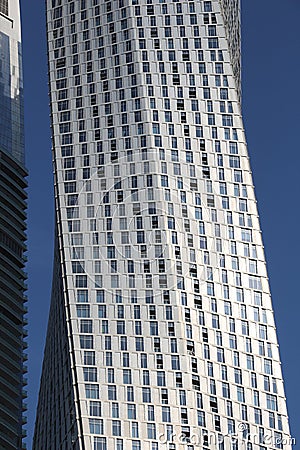 DUBAI, UAE - NOVEMBER 23, 2017: Cayan Tower building in Dubai Marina, UAE. The residential skyscraper was designed by Skidmore, Stock Photo