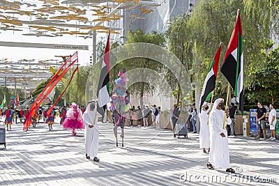 Dubai, UAE - November 15, 2021: Daily Parade at the Expo 2020 in Dubai. Unique cultural moving celebration. Editorial Stock Photo