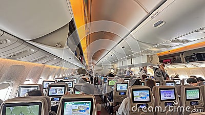 DUBAI,UAE. 16 SEPTEMBER 2023. Passenger settled in, ready for departure, embracing the journey ahead Editorial Stock Photo