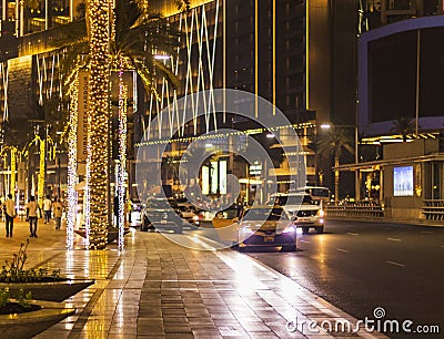 Dubai, UAE - 08.09.2022 - Shot of a street in downtown area at night. City Editorial Stock Photo