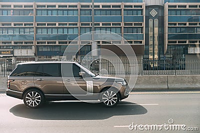 Dubai, UAE, United Arab Emirates - May 28, 2021: Black 2013 Range Rover Vogue car fast mooving on street in Dubai. Land Editorial Stock Photo