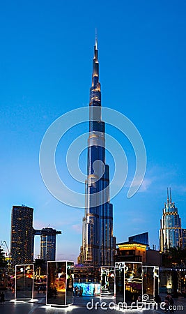 Dubai, United Arab Emirates - January 31, 2018: Burj Khalifa and spinning mirrors and light art installation in Burj plaza of Stock Photo