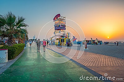 Dubai, United Arab Emirates, March 24, 2021: Kite beach in Dubai with large walking and running path by the seaside at sunset Editorial Stock Photo