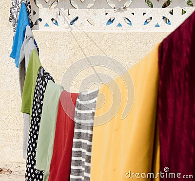 Roof top dress hanging different colours Stock Photo