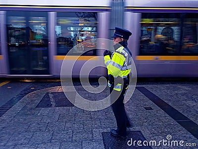 Garda officer on duty in Dublin city center, Editorial Stock Photo