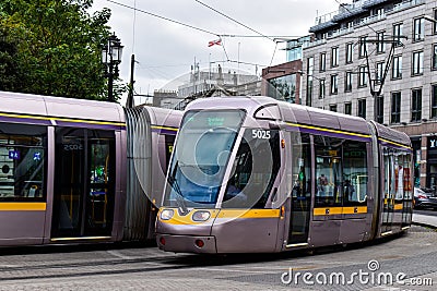 DUBLIN, IRELAND - 23 May 2020: Luas trams passing by at st stephens green in Dublin city centre Editorial Stock Photo