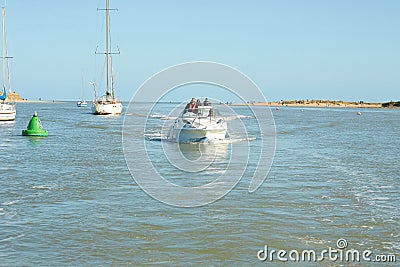 Dublin, Ireland - 04.03.2021: Sport motorboat moving in the harbor. Editorial Stock Photo