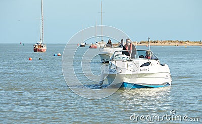 Dublin, Ireland - 04.03.2021: Sport motorboat moving in the harbor. Editorial Stock Photo