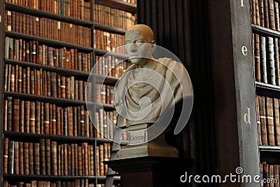 Old Library in Trinity College Cicero sculpture Editorial Stock Photo