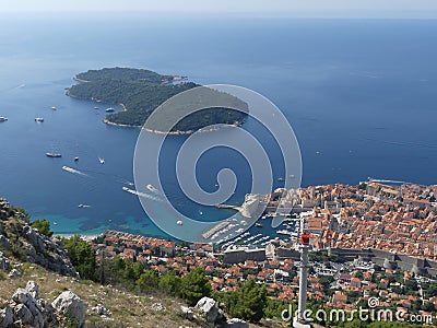 Tourists looking out over panorama view of Dubrovnik old town Editorial Stock Photo