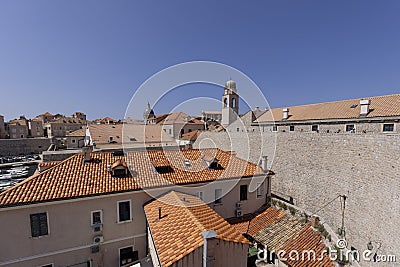 City Walls with Clock tower, surrounding medieval city on the Adriatic Sea, Dubrovnik, Croatia Editorial Stock Photo