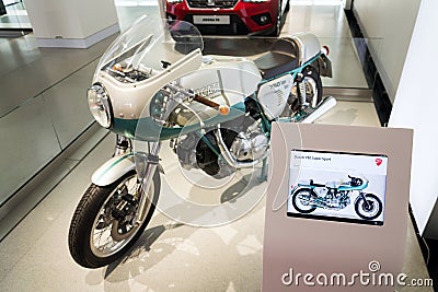 Ducati 750 Super Sport motorcycle standing at Volkswagen Group forum Drive in Berlin, Germany Editorial Stock Photo