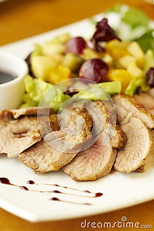 Duck breast with fruit flambe Stock Photo