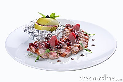 Duck breast with sauce of raspberry. Stock Photo