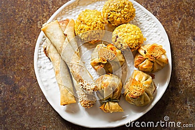 Duck party food selection. Sesame duck cigars, duck moneybags, crispy duck bonbons. Stock Photo