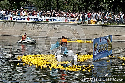 Start of a rubber duck toy race Editorial Stock Photo
