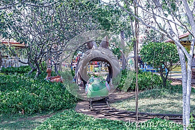 Duck train funfair ride coming out of the dragon mouth, Chennai, India. Jan 29 2017 Editorial Stock Photo