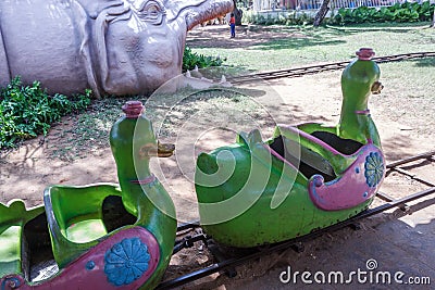 Duck train funfair ride entering the dragon mouth, Chennai, India. Jan 29 2017 Editorial Stock Photo