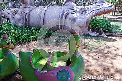 Duck train funfair ride entering the dragon mouth, Chennai, India. Jan 29 2017 Editorial Stock Photo